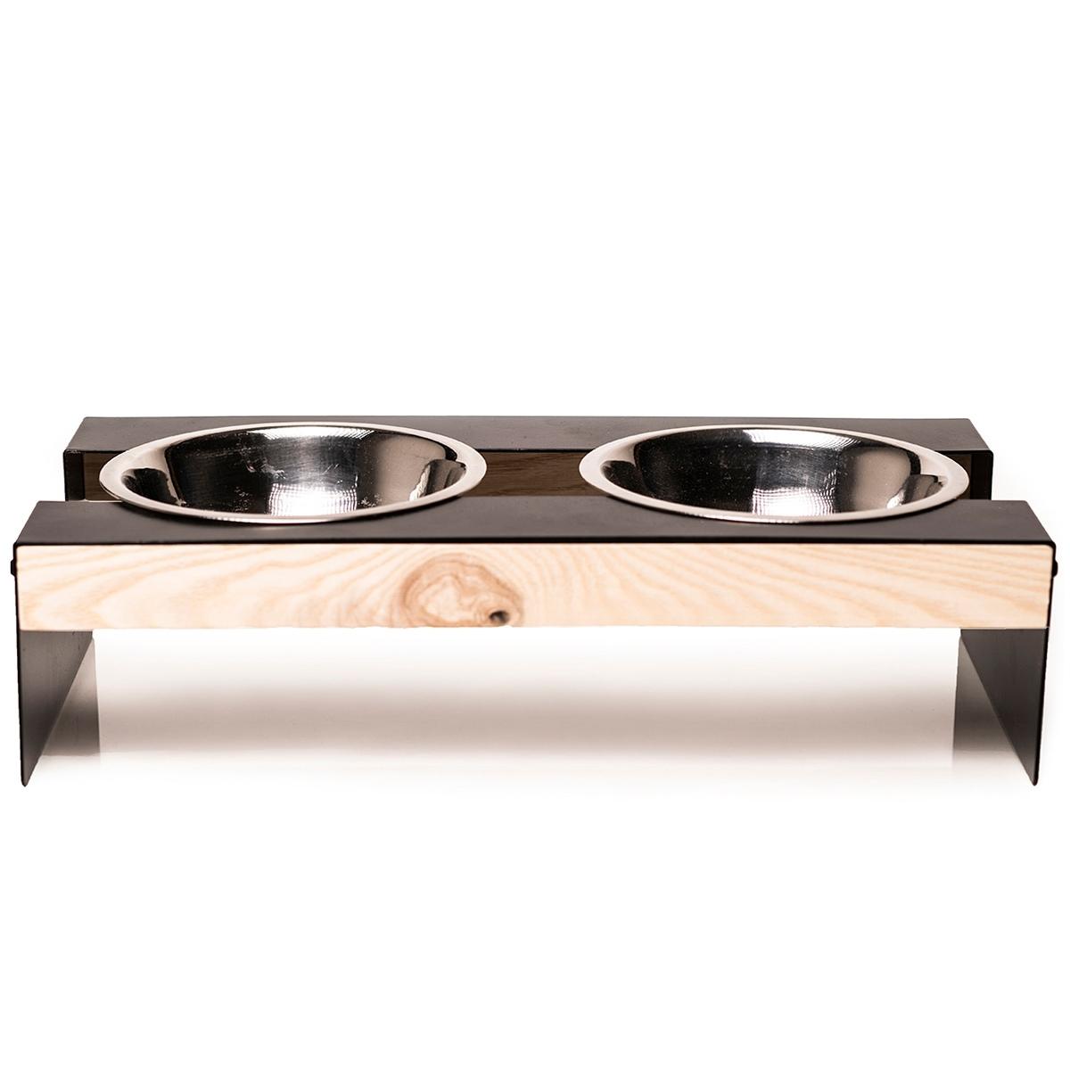 Stainless steel dog bowls in a sleek metal frame with smooth wooden accents. Elevated design for easy access.