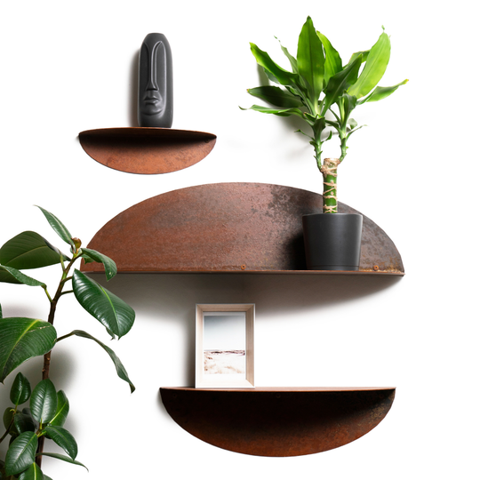 Semicircular rusted metal wall shelves showcasing plants, decor, and framed pictures, adding industrial charm to modern interiors.