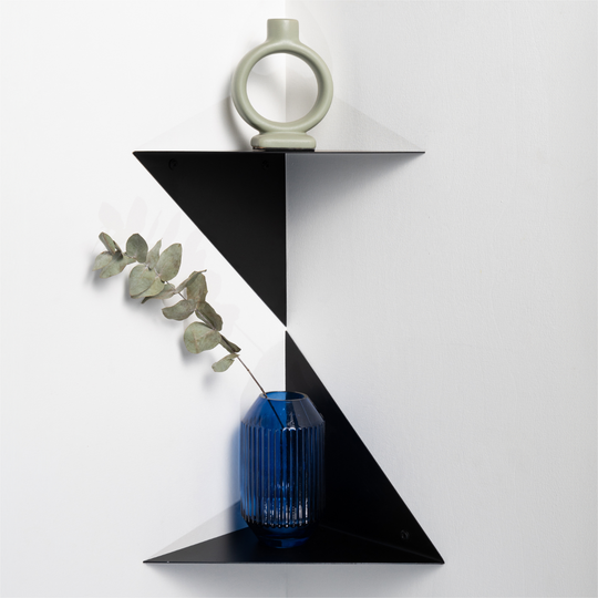 two metal corner shelves on white background with blue vase and plant decor in it and circular vase on top of it