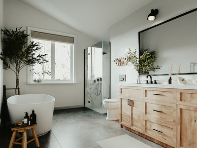 wooden and metal bathroom accessories, including unique toilet paper holders, towel racks, and mirrors designed to enhance the functionality and aesthetics of modern bathrooms.
