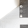 Close-up of perforated metal texture with labels highlighting features: made in Europe, available in black and white, crafted from high-quality steel, and supports up to 3 kg (6.6 lbs). EWART WOODS logo displayed at the bottom.