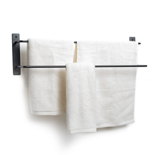 Black metal wall-mounted towel rack with two horizontal bars, holding three neatly arranged white towels.