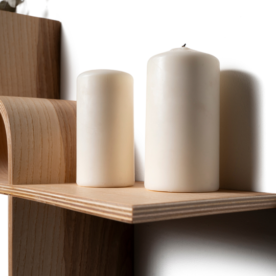 Wooden shelf with asymmetrical shape with open space for decor