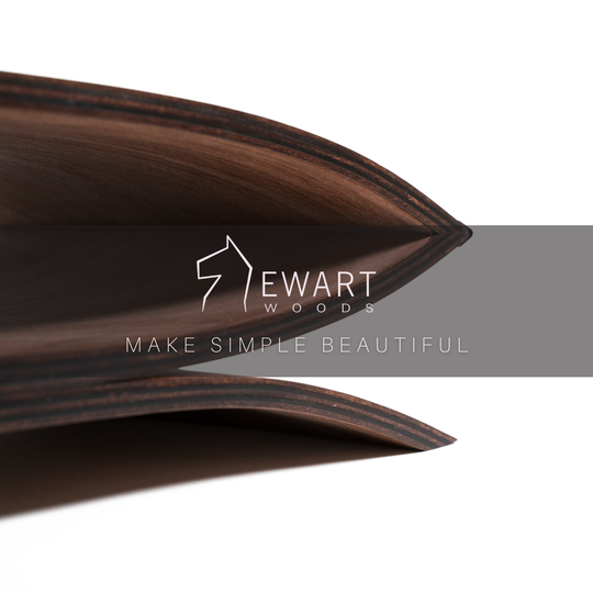 Close-up of wooden monitor stand for desk by EWART WOODS