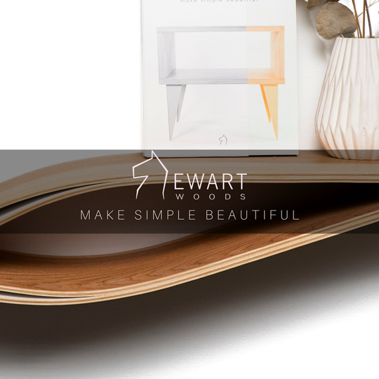 Wooden floating shelf in fish form design close-up