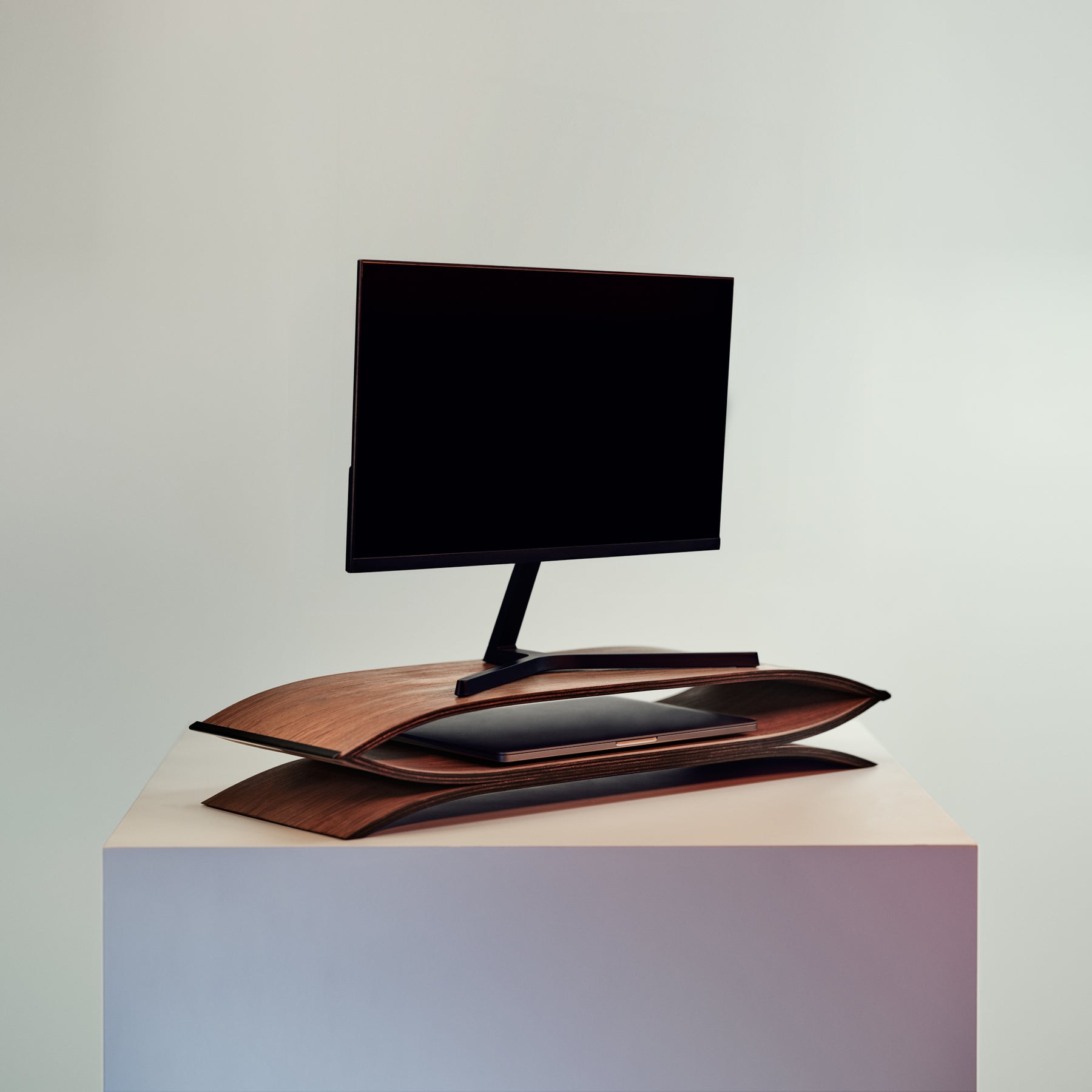 Modern wooden monitor stand with metal edges for desk organization 