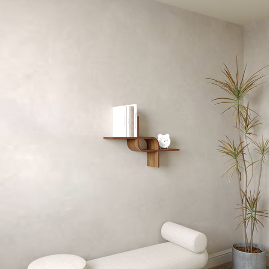 walnut floating wall shelf with hidden mounting system in light interior with clock and books stored 