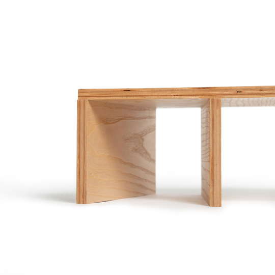 Close-up of wooden monitor stand compartment space