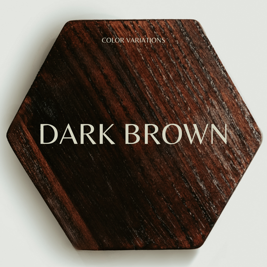 Hexagonal wooden key holder with a natural wood grain pattern, labeled &