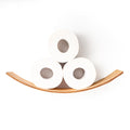 Close-up of a curved wooden toilet paper holder with three toilet paper rolls neatly stacked. The holder features a smooth, natural wood finish, designed for a minimalist and functional display.