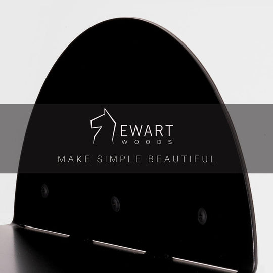 Black wall-mounted half-circle shelf with Ewart Woods logo and slogan &