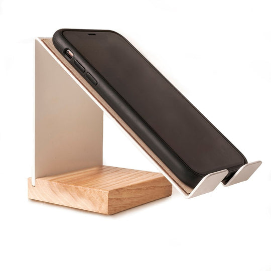 Modern and sleek cell phone stand with a metal frame and wooden base, available in various colors, featuring a charging space. Perfect for hands-free viewing and enhancing any workspace or home.