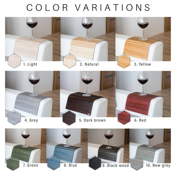 Color variations of wooden armrest trays displayed on a white sofa, each holding a glass of red wine. The trays are labeled as follows: 1. Light, 2. Natural, 3. Yellow, 4. Grey, 5. Dark brown, 6. Red, 7. Green, 8. Blue, 9. Black wood, 10. New grey.