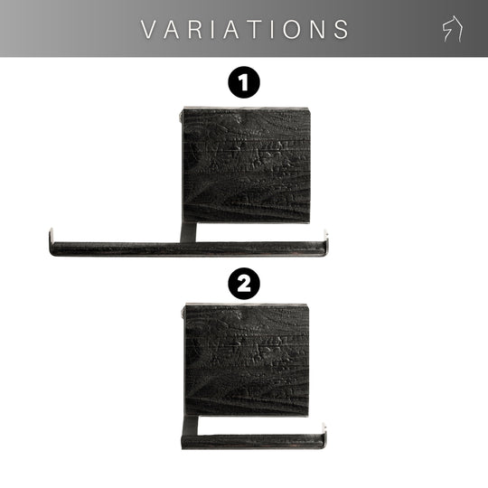 Two variations of a burned ash wood and steel toilet paper holder, displayed side by side. Variation 1 features a horizontal bar, and Variation 2 has a more compact design.