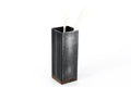 Black metal utensil holder with a wooden base and wooden utensils.