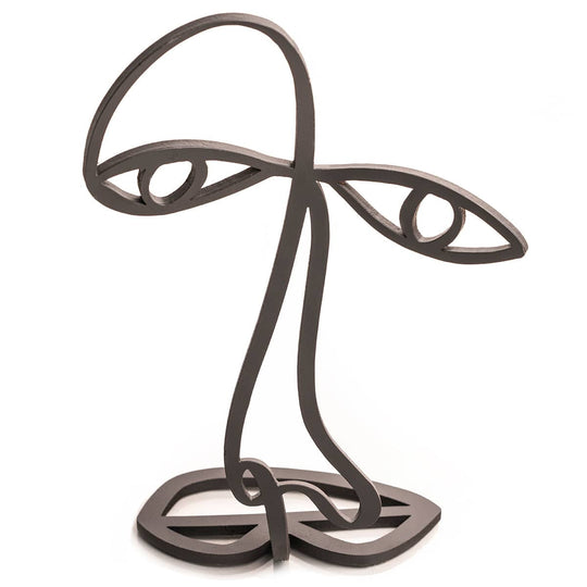 Front view of an abstract black metal glasses stand with a minimalist face design, featuring outlined eyes, nose, and lips in a wireframe structure.