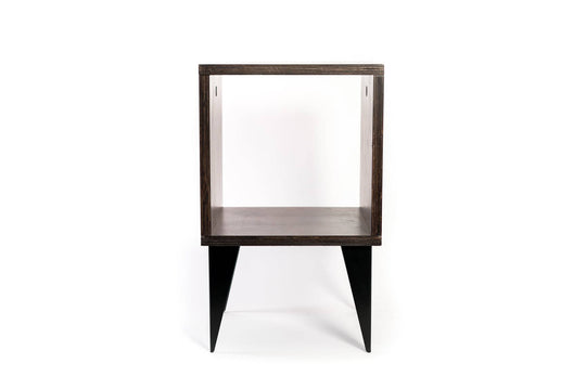 Open compartment furniture piece with a cube-shaped design, dark-stained wood, and sleek black tapered legs, ideal for minimalist storage and versatile use.
