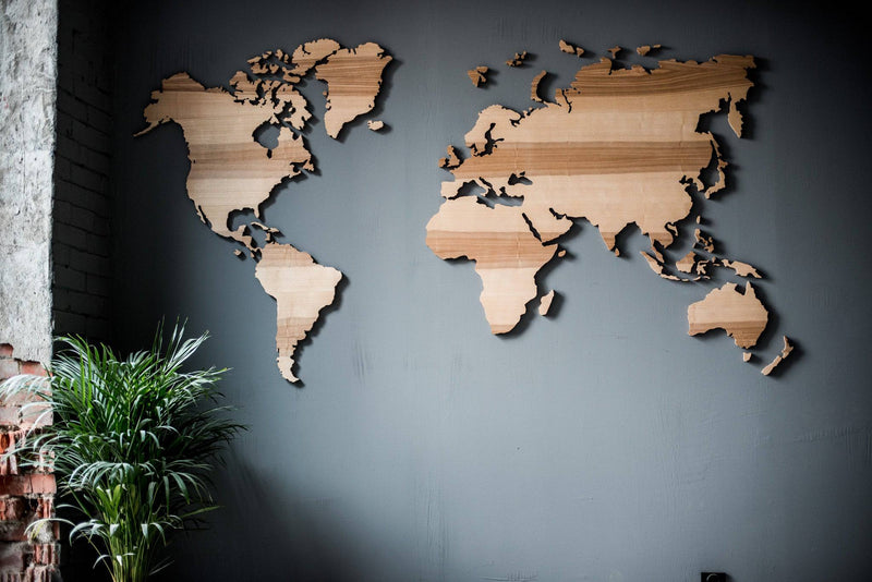 Wooden world map wall decor laser cut from natural wood for modern interior