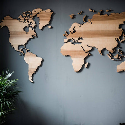 Wooden world map wall decor laser cut from natural wood for modern interior