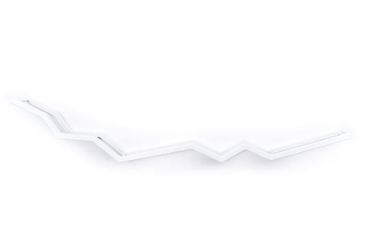 Close-up of a wall-mounted white zigzag toilet paper holder with a textured wood surface, showcasing the intricate zigzag design with metal bars.